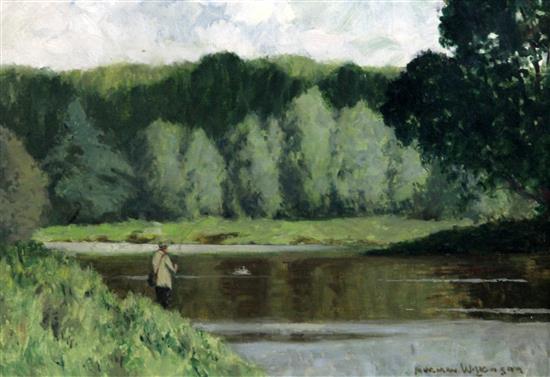 Norman Wilkinson (1878-1971) Fly fisherman beside a river 14 x 20in.